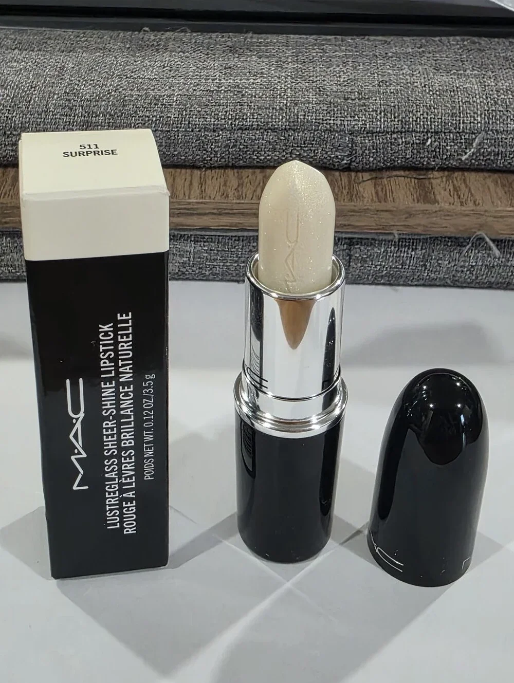 MAC Lustreglass Sheer-Shine Lpstick Surprise/Clear with champagne gold Pearl.